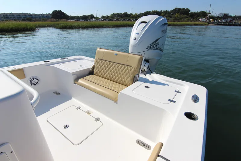 Slide: The Image of 2021 Sportsman Masters 267OE Bay Boat with Yamaha engine on calm water. - 20