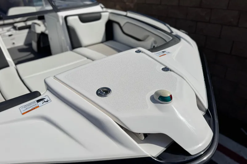 Slide: The Image of 2019 Yamaha Boats AR210 bow area with seating and navigation light. - 10