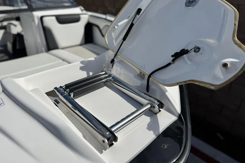 Slide: The Image of 2019 Yamaha AR210 boat with open hatch and retractable ladder. - 11
