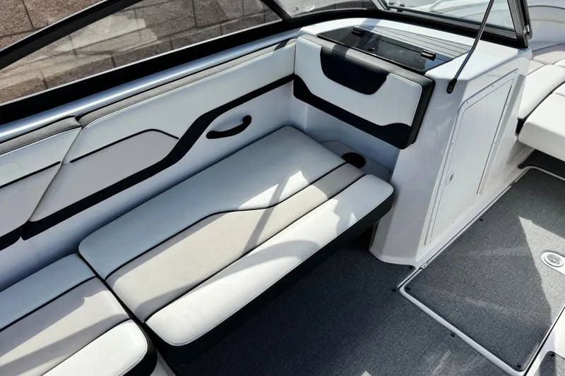 Slide: The Image of 2019 Yamaha Boats AR210 interior seating with sleek design and comfortable upholstery. - 21