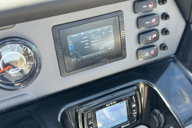 Slide: The Image of 2019 Yamaha AR210 dashboard with digital display and control panel. - 28