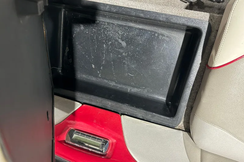 Slide: The Image of Storage compartment in a 2009 Malibu Wakesetter 23 LSV boat interior. - 10