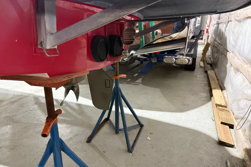 Slide: The Image of 2009 Malibu Wakesetter 23 LSV boat on stands in storage facility. - 12