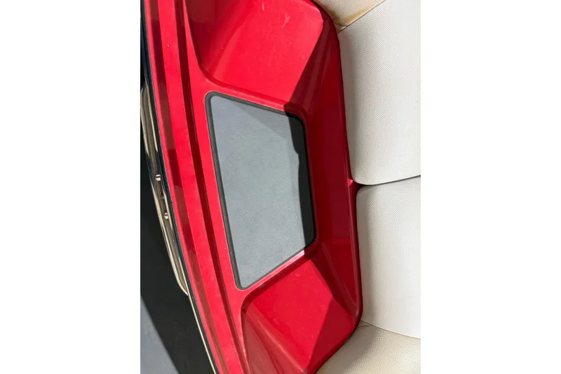 Slide: The Image of Red and beige interior of 2009 Malibu Wakesetter 23 LSV boat. - 24