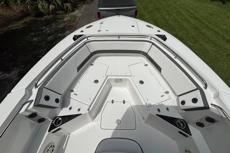 Slide: The Image of 2020 Blackfin 252 CC boat interior with seating and storage compartments. - 14