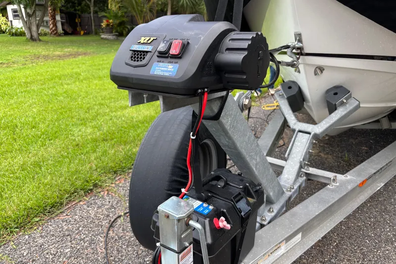 Slide: The Image of Trailer hitch with electric winch attached to a 2020 Blackfin 252 CC boat. - 32