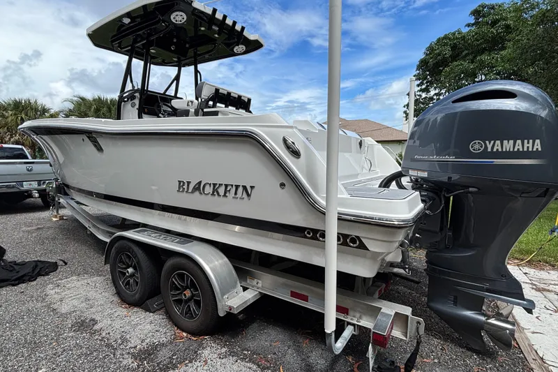 Slide: The Image of 2020 Blackfin 252 CC boat with Yamaha engine on a trailer. - 6