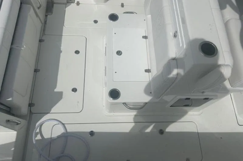 Slide: The Image of 2025 Parker 2900 Center Console boat interior with seating and storage compartments. - 14