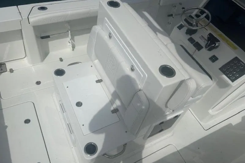 Slide: The Image of 2025 Parker 2900 Center Console boat interior with seating and control panel. - 16