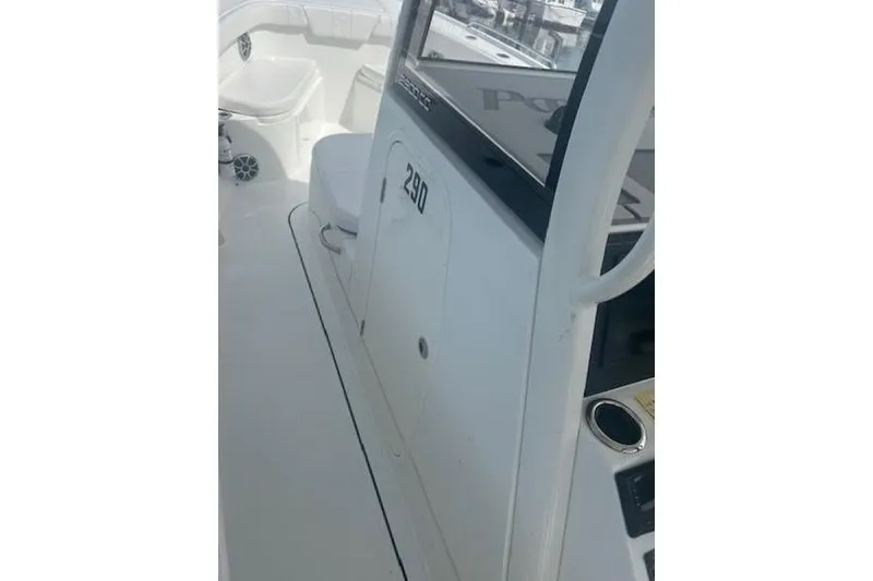 Slide: The Image of 2025 Parker 2900 Center Console boat interior, featuring sleek white design and seating area. - 4