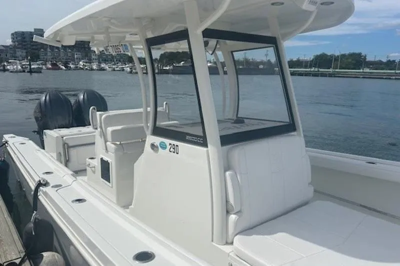Slide: The Image of 2025 Parker 2900 Center Console boat docked by the waterfront. - 5