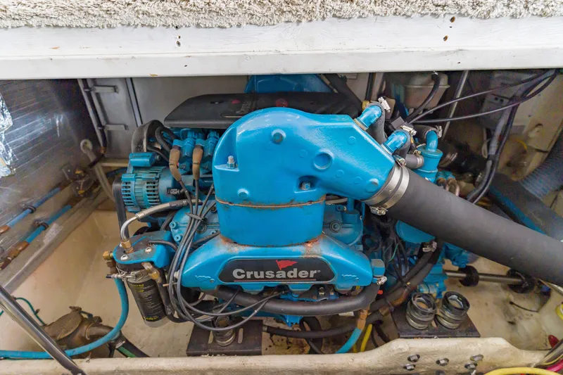 Slide: The Image of Engine compartment of a 2005 Silverton 34 Convertible boat with Crusader engine. - 30