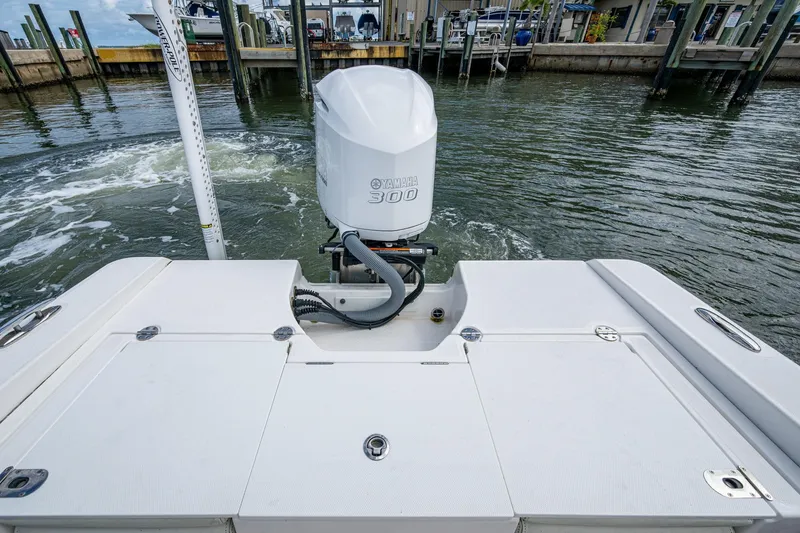 Slide: The Image of 2021 Everglades 253 Center Console boat with Yamaha 300 engine at dock. - 25