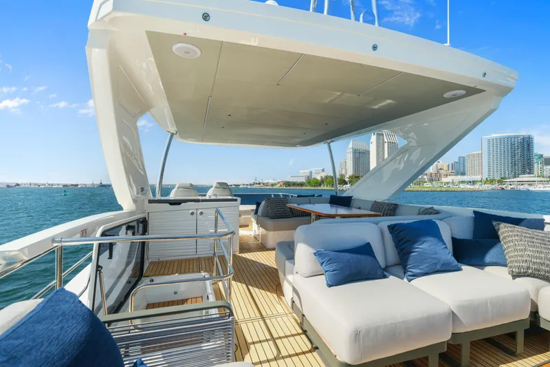 Slide: The Image of Luxurious interior of 2025 Absolute 56 FLY yacht with modern kitchen and seating area. - 13