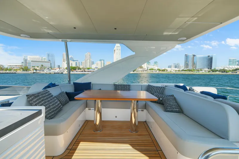 Slide: The Image of Luxurious interior of 2025 Absolute 56 FLY yacht with modern seating and ocean view. - 19