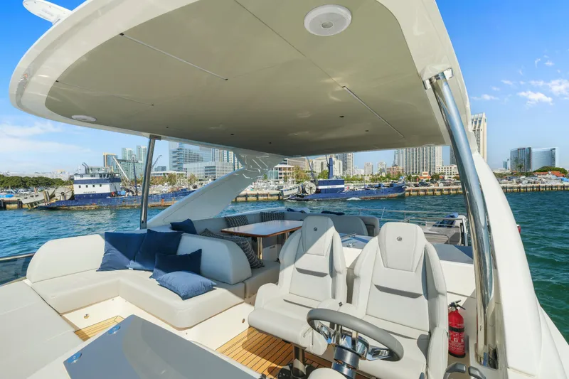 Slide: The Image of Luxurious bathroom interior of 2025 Absolute 56 FLY yacht with marble countertop and glass shower. - 24