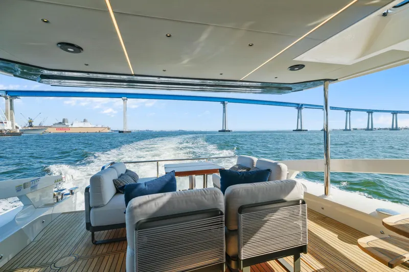 Slide: The Image of Luxurious twin cabin interior on 2025 Absolute 56 FLY yacht, featuring modern design and ensuite bathroom. - 30