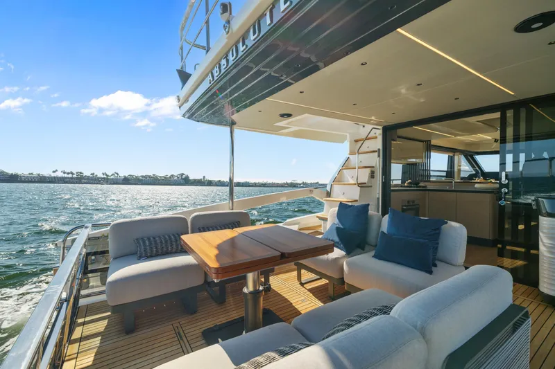 Slide: The Image of Luxurious bedroom interior of 2025 Absolute 56 FLY yacht with modern decor and ensuite bathroom. - 37