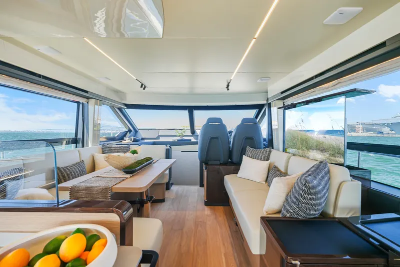 Slide: The Image of Luxurious 2025 Absolute 56 FLY yacht interior with city skyline view. - 41