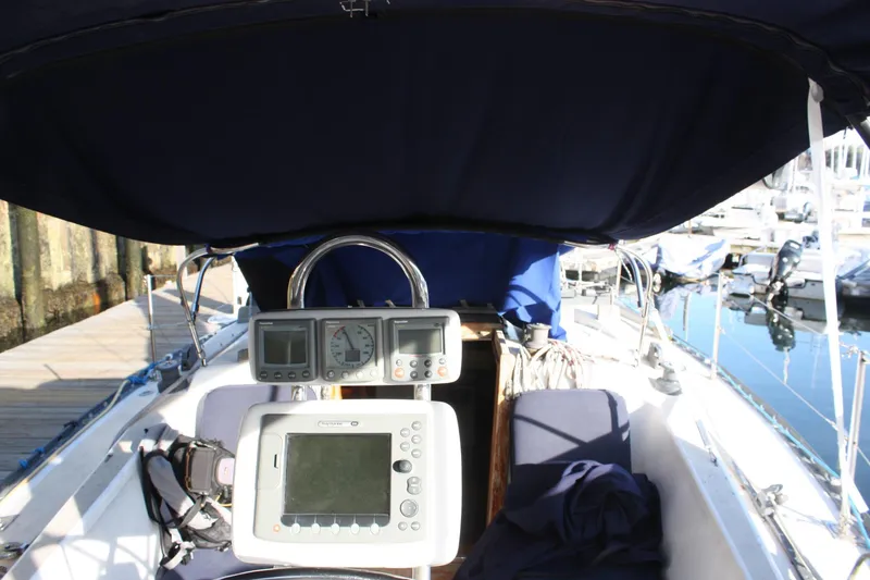 Slide: The Image of Cockpit of a 1976 Tartan 38 sailboat with navigation instruments. - 12