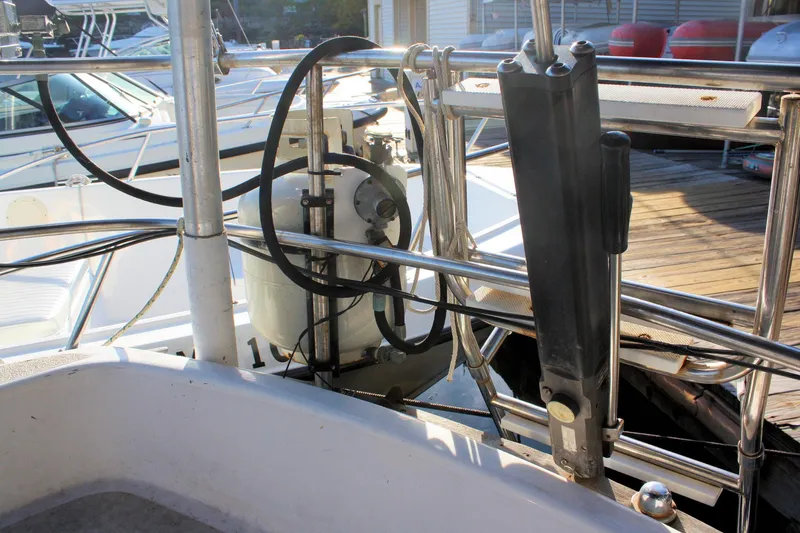 Slide: The Image of 1976 Tartan 38 sailboat deck with rigging and equipment details. - 13