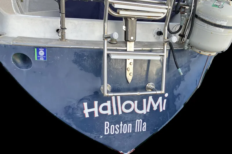 Slide: The Image of Sailboat stern with "Halloumi" name, Tartan 38 model, Boston, MA, 1976. - 3