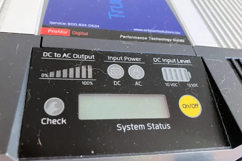 Slide: The Image of Control panel of a Tartan 38, 1976 model, showing power and system status indicators. - 49