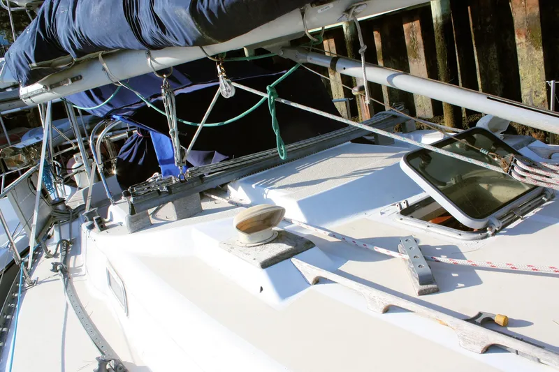 Slide: The Image of 1976 Tartan 38 sailboat deck with rigging and open hatch. - 8