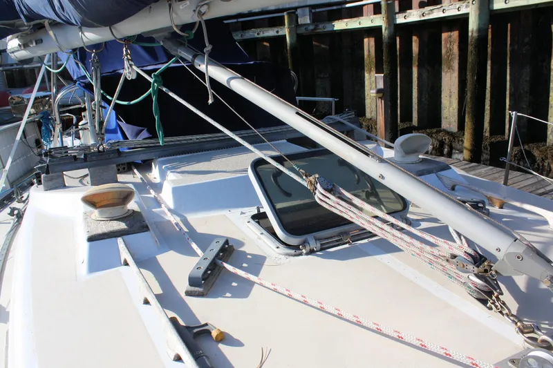 Slide: The Image of 1976 Tartan 38 sailboat deck with rigging and open hatch. - 9