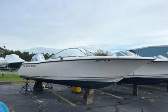 Slide: The Image of 2020 Key West 203 DFS boat on stands in a parking lot. - 1