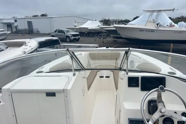 Slide: The Image of 2020 Key West 203 DFS boat interior at a marina with other boats. - 12