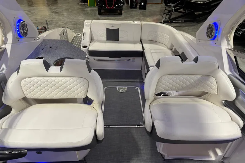 Slide: The Image of Luxurious interior of 2014 Chaparral 327 SSX boat with plush seating and modern design. - 10