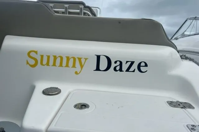 Slide: The Image of 2021 Key West 239 FS boat with "Sunny Daze" name on the side. - 8