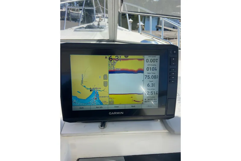 Slide: The Image of Garmin GPS display on 1987 Luhrs 30 Alura Classic boat, showing navigation and depth data. - 13