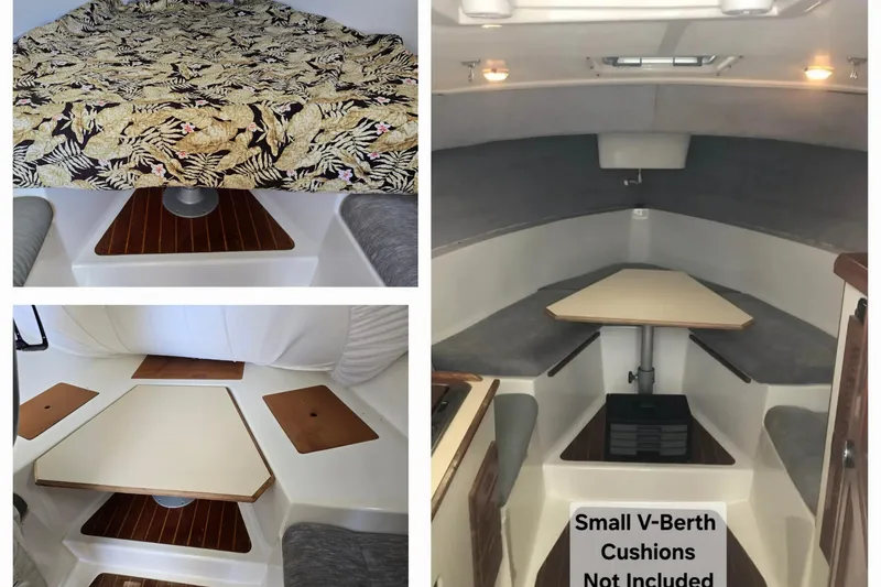 Slide: The Image of 1987 Luhrs 30 Alura Classic interior with V-berth, table, and patterned bedding. - 19