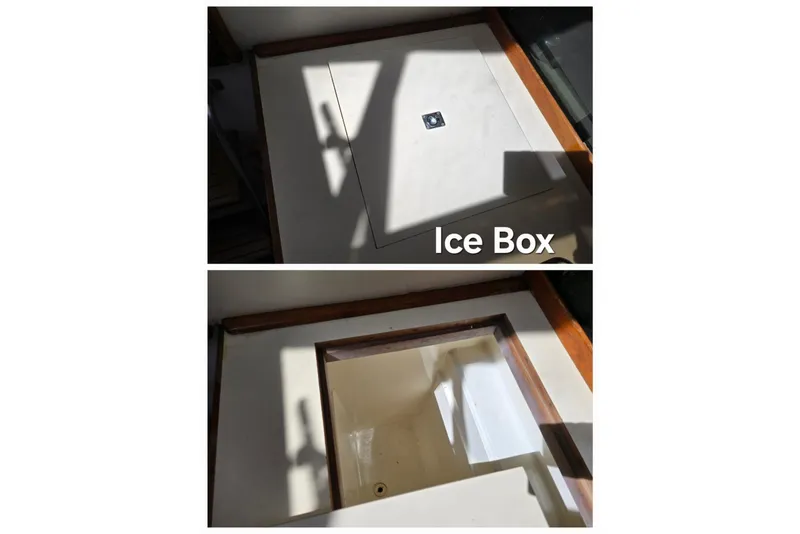 Slide: The Image of 1987 Luhrs 30 Alura Classic boat ice box, closed and open views. - 23