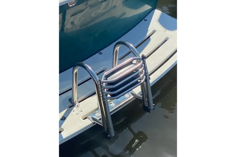 Slide: The Image of Stainless steel swim ladder on 1987 Luhrs 30 Alura Classic boat. - 8