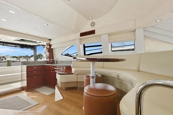 Slide: The Image of Luxurious interior of 2008 Sea Ray 47 Sedan Bridge yacht with modern furnishings. - 24