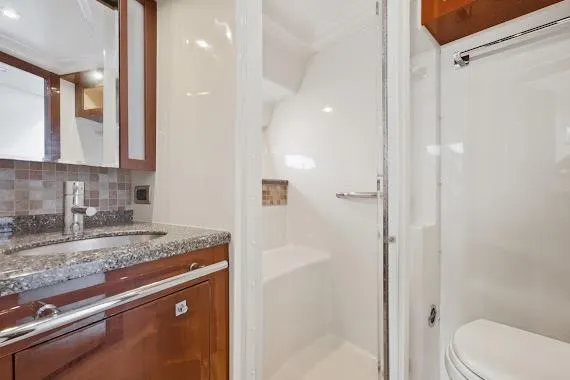 Slide: The Image of Luxurious bathroom interior of 2008 Sea Ray 47 Sedan Bridge yacht. - 34
