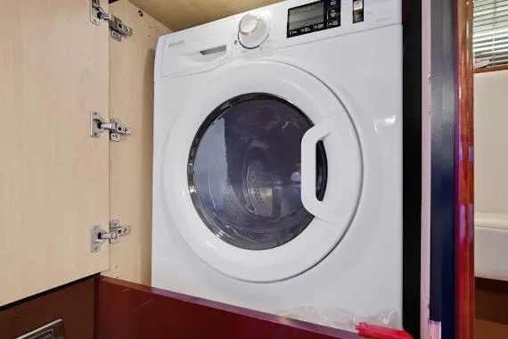 Slide: The Image of Washing machine inside 2008 Sea Ray 47 Sedan Bridge yacht's cabin. - 36