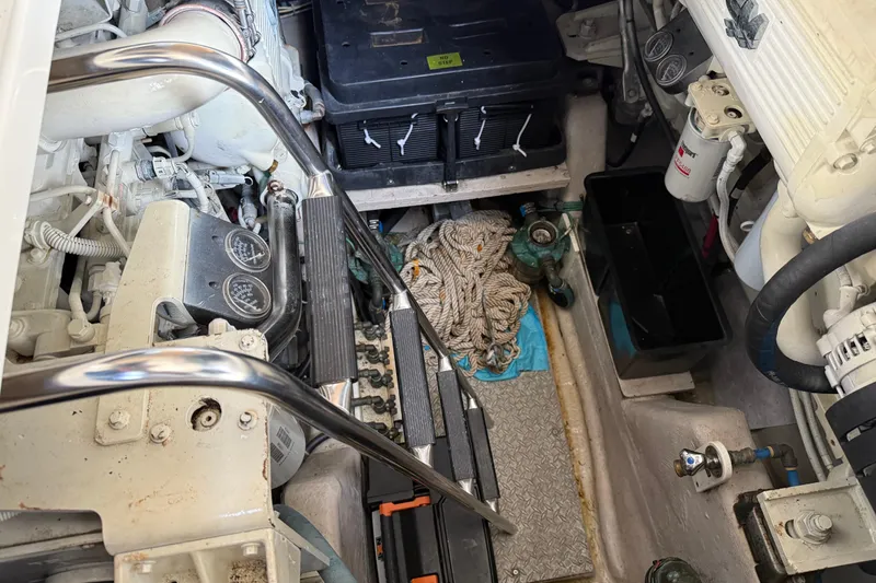 Slide: The Image of Engine room of 2008 Sea Ray 47 Sedan Bridge with equipment and ropes. - 41