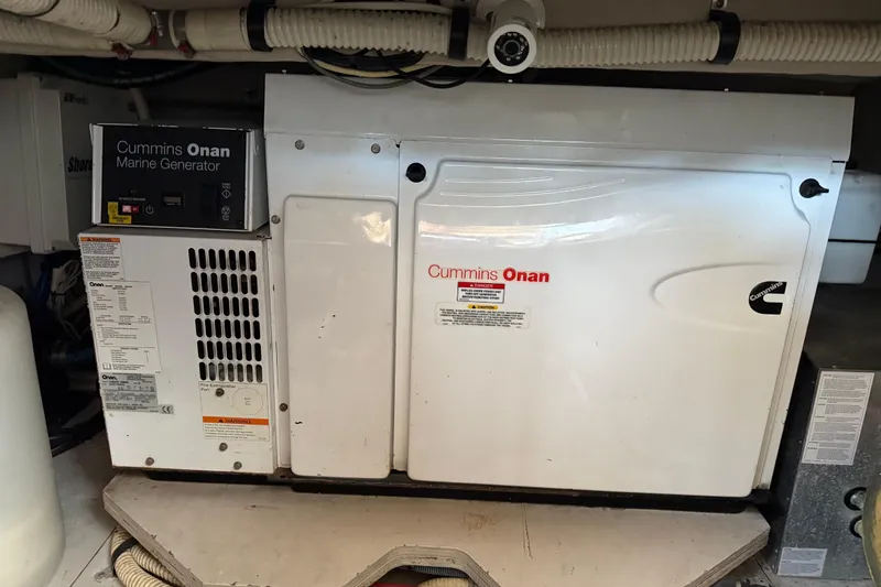 Slide: The Image of Cummins Onan marine generator in 2008 Sea Ray 47 Sedan Bridge yacht engine room. - 43