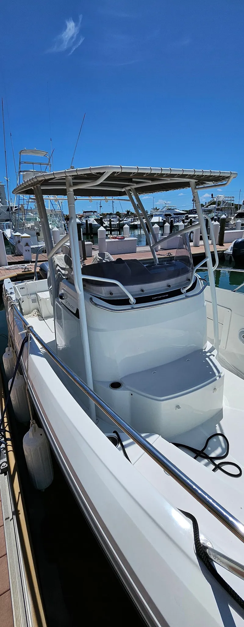 Slide: The Image of 2019 Jeanneau Leader 7.5 CC boat docked under clear blue sky. - 3