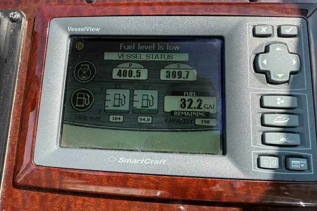 Slide: The Image of SmartCraft VesselView display on 2012 Sea Ray 330 Sundancer showing low fuel status. - 16