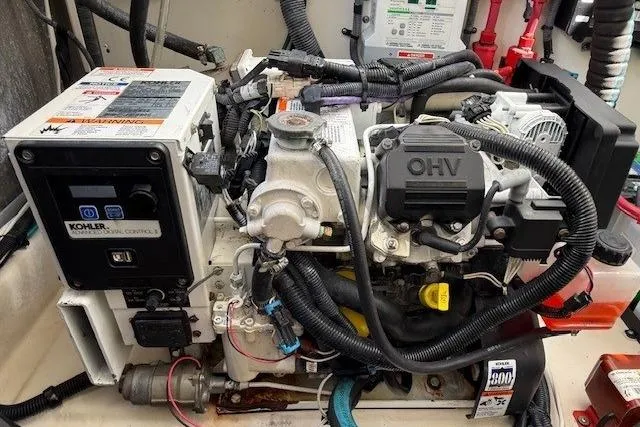 Slide: The Image of Engine compartment of 2012 Sea Ray 330 Sundancer with Kohler generator and wiring. - 31