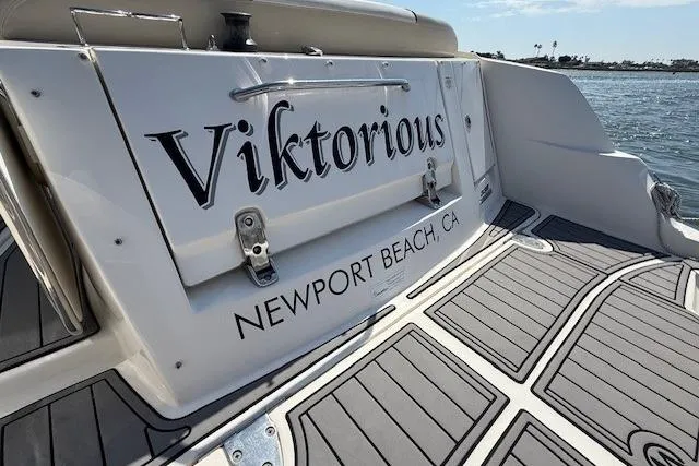 Slide: The Image of 2012 Sea Ray 330 Sundancer boat named "Viktorious" docked in Newport Beach, CA. - 8