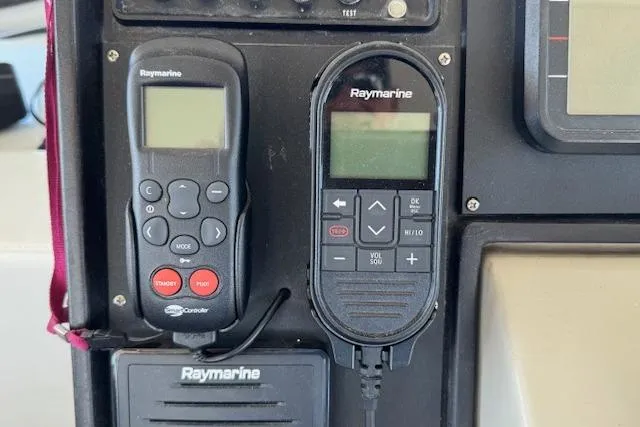 Slide: The Image of Control panel of a 1974 Chris-Craft 47 Commander with Raymarine devices. - 16