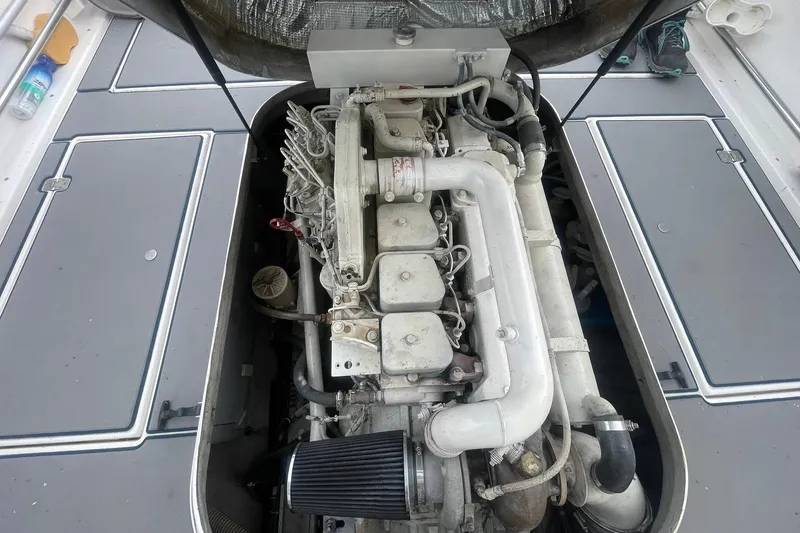 Slide: The Image of Interior helm of 1995 Albin 28 Tournament Express boat with steering wheel and controls. - 12