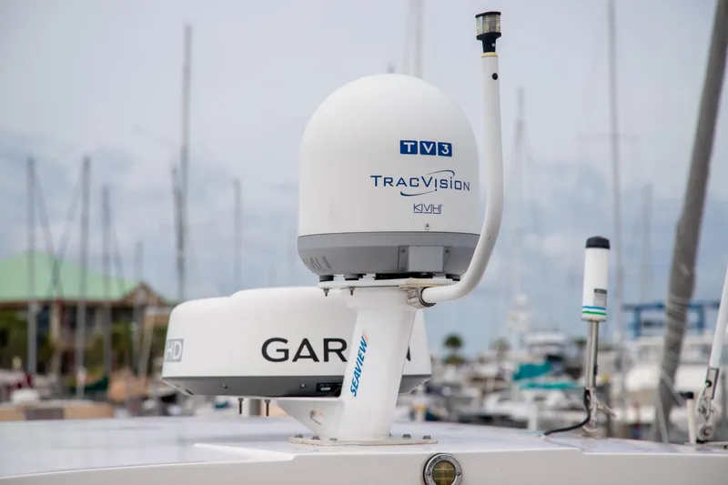 Slide: The Image of Satellite equipment on 2016 Regal 42 Grande Coupe yacht, featuring TracVision and Garmin technology. - 26