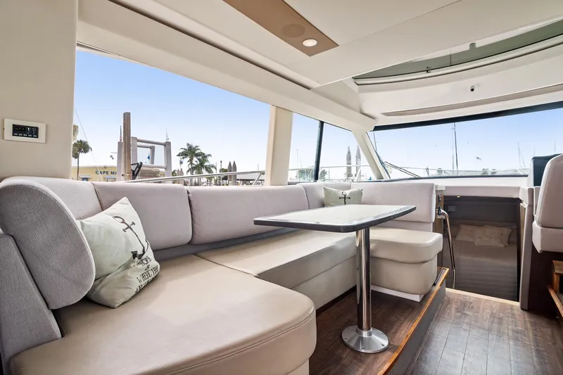 Slide: The Image of 2016 Regal 42 Grande Coupe yacht docked at marina, rear view. - 6